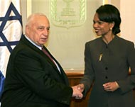 Rice will not attend the summit with Sharon (L) and Abbas 