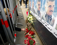 Mourners laid flowers outside al-Hariri's home