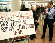 Supporters of the protestersheld banners at the airport 