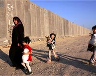 Palestinians say the wall is absorbing some of their lands