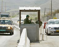 Israel will maintain its military roadblocks on the main highway