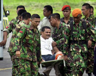 Indonesian troops have arrived to help in the rescue and clean-up