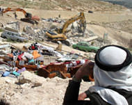 The separation barrier continuesto swallow up Palestinian homes