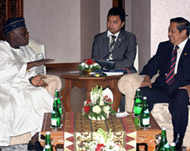 Obasanjo (L) used the summit to highlight strains of globalisation 
