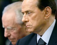 The report comes at a time when Berlusconi is under pressure