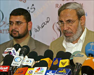 Hamas leader Mahmoud al Zahra (R) disputed some of the results