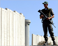 Palestinians say the Israeli wall is an attempted land grab 