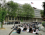 Muslims pray during a protestoutside the US embassy 