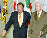 Lebanese president (L) recalled years of violence in his country
