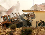 Homes were bulldozed after settlers were evacuated