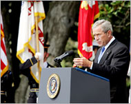 President Bush on Friday honours public safety officers who died on 9/11