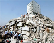 Residents search the rubble ofbuildings for survivors