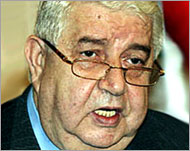 Walid al-Mualim denied he had threatened Rafiq al-Hariri