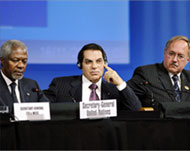 Kofi Annan and Tunisia presidentBen Ali (C) at the opening session