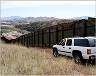 Protesters oppose plans to buildextra fencing on the border 