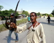 Sword-wielding Timorese youthsare defying peacekeepers