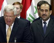 Dennis Hastert (L) assured al-Maliki of US support
