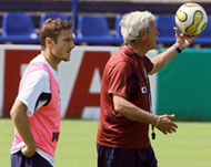 Italian talisman Francesco Totti (l) with coach Marcello Lippi (r)