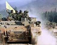 Israeli troops with a Hezbollah flag returning from south Lebanon 