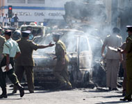 Soldiers inspect the site of theblast in Colombo on Tuesday