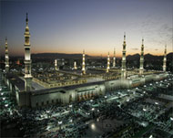 The sun sets over the Mosque of Prophet Muhammad, Madina