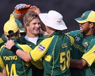 Shane Watson (second from left)after taking the wicket of Ian Bell