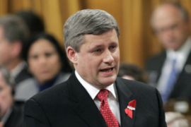 Canada's Prime Minister Stephen Harper stands to speak in the House of Commons on Parliament Hill in Ottawa