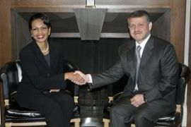 Jordanian King Abdullah II shakes hands with US Secretary of State Condoleezza Rice