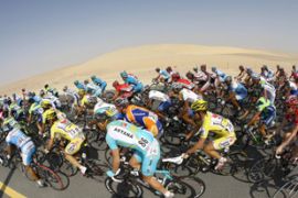 Cyclists compete during the third stage of the 6th edition Tour of Qatar cycling race in Doha, 30 January 2007