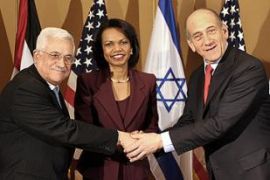 US Secretary of State Condoleezza Rice (C), Palestinian leader Mahmud Abbas (L) and Israeli Prime Minister Ehud Olmert