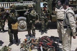 Africa Union, AU, soldiers and Somali government forces make 03 May 2007 an inventory of weapons surrendered by businessmen based in the strife torn capital, Mogadishu. AFP