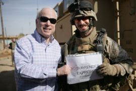 John McCain and US soldier