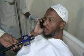 sami al-hajj on the phone in hospital