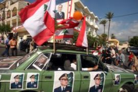 Lebanese celebrate the election of Lebanese army chief Michel Sleiman as president