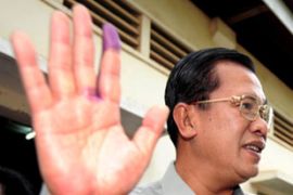 Hun Sen show finger after voting