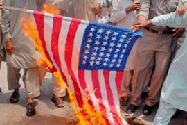 Pakistani protesters burn US flag