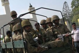 Pakistani troops guard funeral