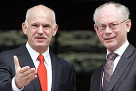 Greek Prime Minister George Papandreou (L) welcomes the President of the European Council Herman Van Rompuy