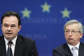 Greek Finance Minister Papaconstantinou and Luxembourg''s PM Juncker address a joint news conference in Brussels