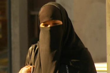 Woman wearing full face veil