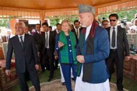 Clinton, Karzai tour market