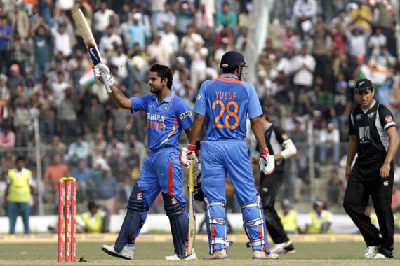 Indias Virat Kohli celebrates after scoring a century, cricket