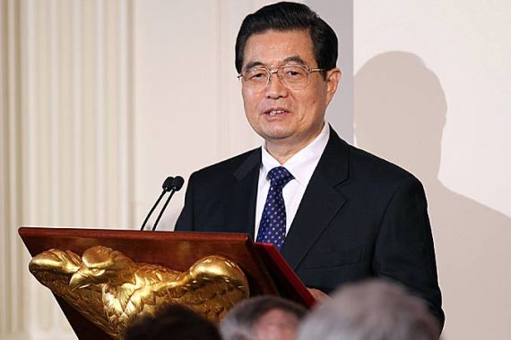 Chinese President Hu Jintao speaks during a state dinner hosted by US President Barack Obama at the State Dining Room of the White House in Washington, DC, on 19 January 2011