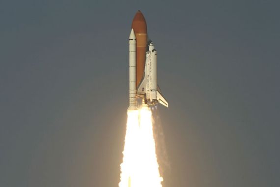 Space shuttle Discovery lifts off