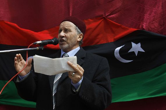Mustafa Abdel Jalil, head of the rebel National Libyan Council based in the eastern rebel-held city of Benghazi, talks to his supporters in Beyda March 4, 2011. REUTERS/Asmaa Waguih (LIBYA - Tags: POLITICS CIVIL UNREST)
