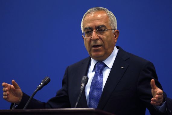 Palestinian Prime Minister Salam Fayyad speaks during a news conference in the West Bank city of Ramallah in this May 2, 2011 file photo. Fayyad suffered a heart attack while visiting the United States but is stable, a Palestinian government spokesman said on May 23, 2011. REUTERS/Mohamad Torokman/Files (WEST BANK - Tags: POLITICS HEALTH PROFILE)