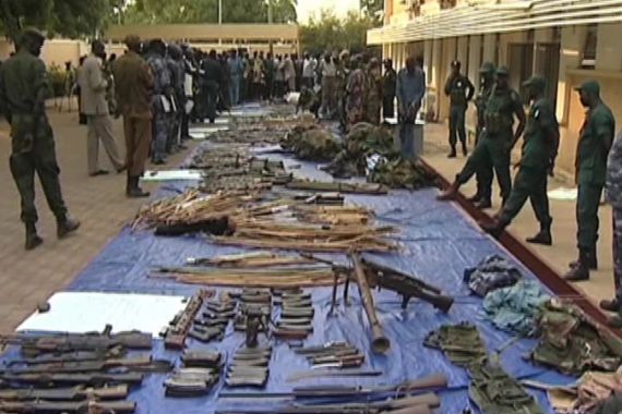 Soldier Sudan arms cache Kordofan