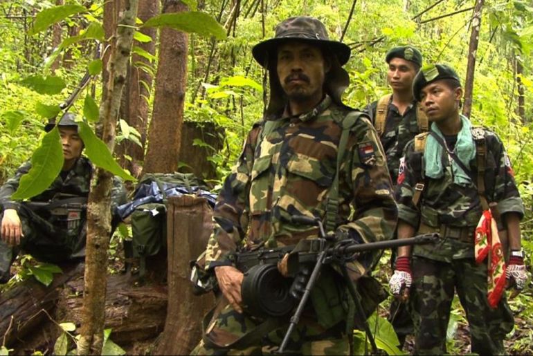 KNLA soldiers in the forest FOR 101 EAST - The World’s Longest Ongoing War
