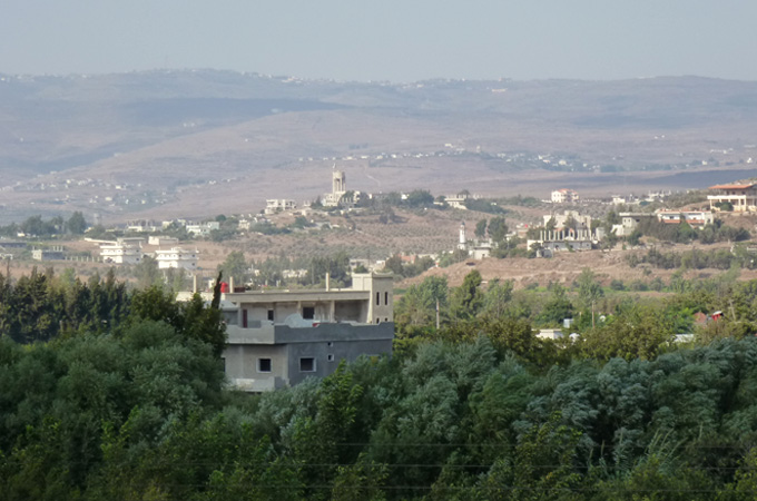 Talkalakh and other Syrian villages can be seen from the Lebanese side of the border (Cajsa Wikstrom)