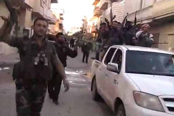 Members of the "Syrian Free Army" announce presence in Homs